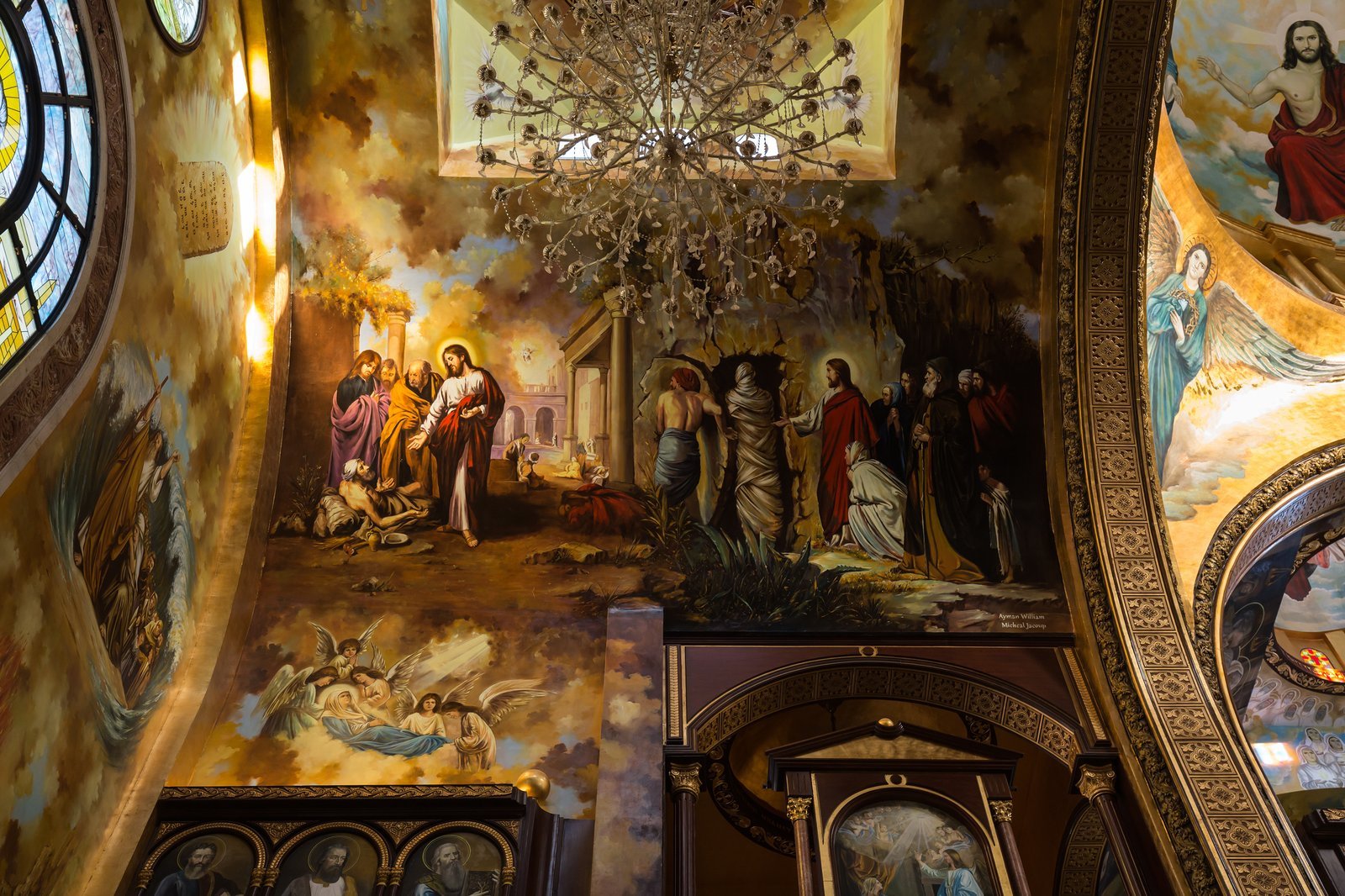 Church ceiling with religious frescoes, angels, and ornate decorations